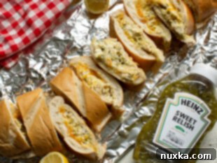 Sliced chicken salad sandwich ready to be served.