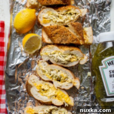 A perfectly assembled chicken salad sandwich, ready to be enjoyed.