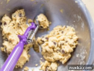Mixing butter and sugars for chocolate chip cookies
