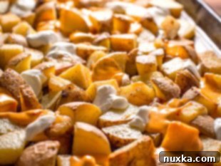 Serving the freshly baked easy loaded potato casserole.