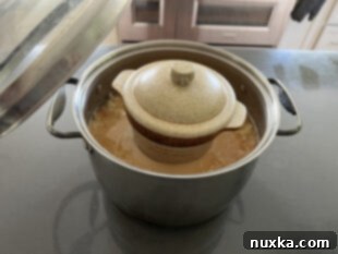 sauerkraut weighed down with an old crock