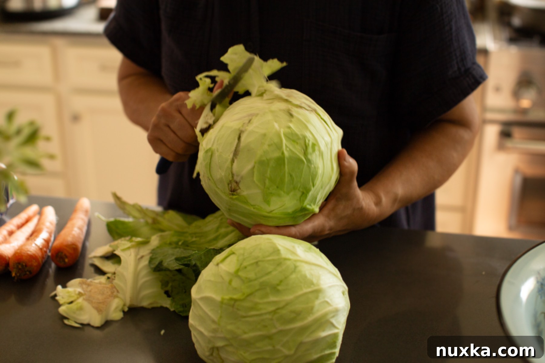 making sauerkraut with shredded carrots 