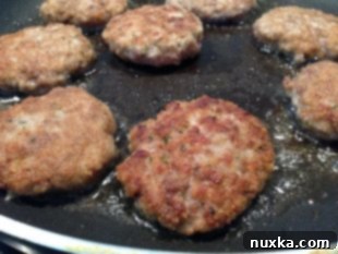 Kotleti frying in a pan to a golden brown