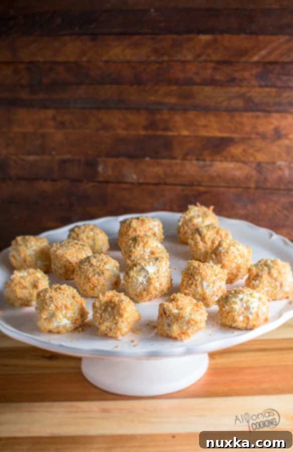 Napoleon cake balls served on an elegant cake stand, ready for guests.