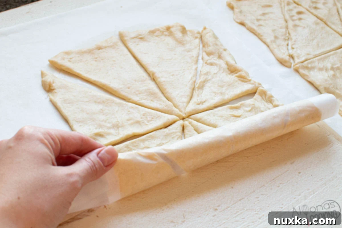 Instructions on how to roll up crescent dough sheets for refrigeration, mirroring Pillsbury cans