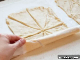 Instructions on how to roll up and store crescent dough sheets for refrigeration