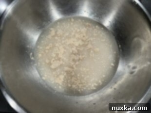 Proofing yeast for French Bread in a mixing bowl