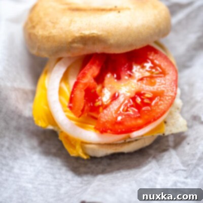 Big Apple Breakfast Bagel 6 manhattan bagel with egg, cheese, tomato and onion