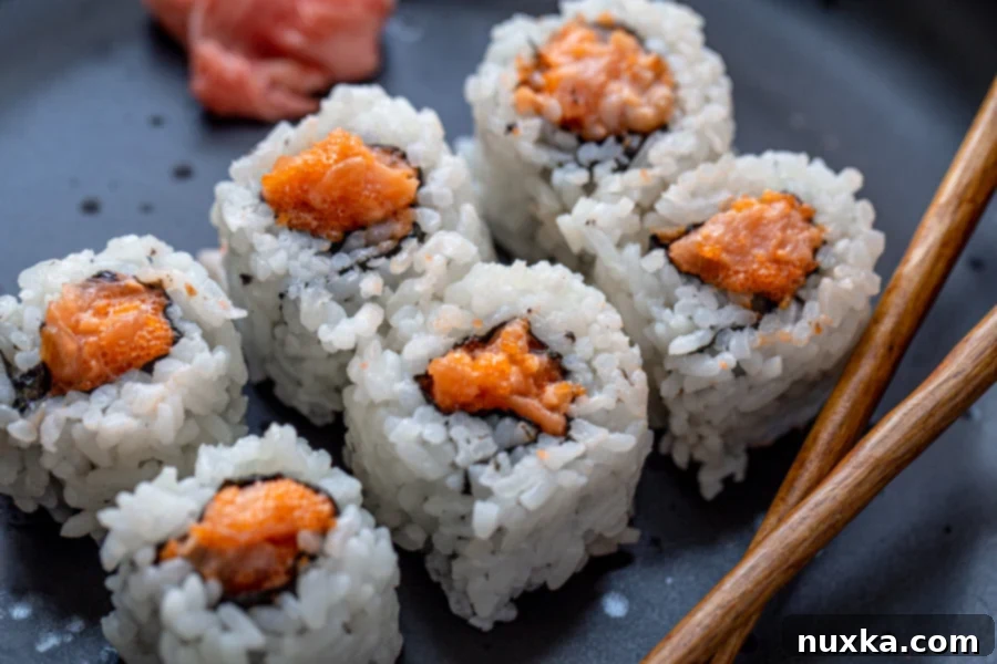 Minced raw tuna mixed with capelin roe and spicy mayo, ready for sushi rolls