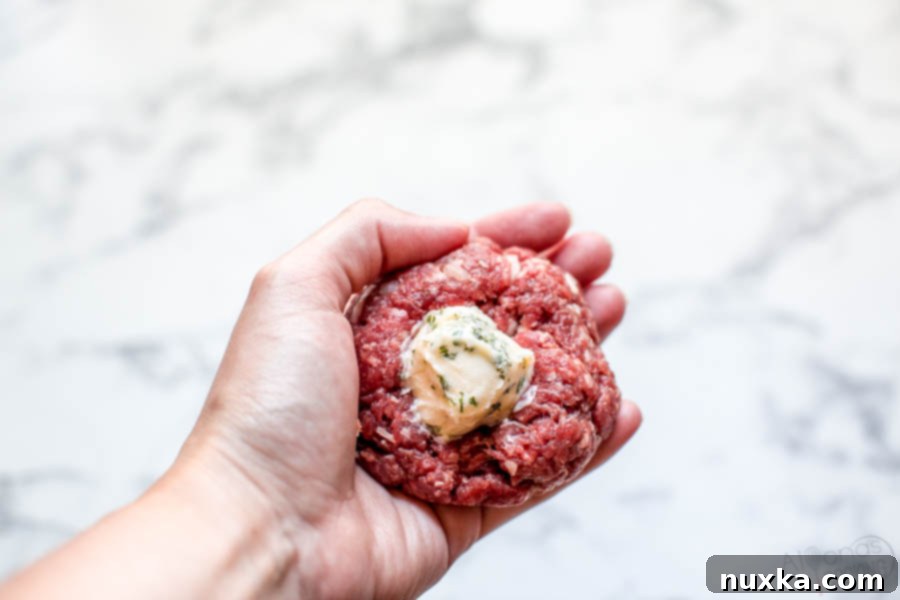 how to make stuffed burgers, showing a patty being filled