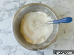combined dry ingredients for banana bread (all-purpose flour, baking soda, granulated sugar, brown sugar, and salt)
