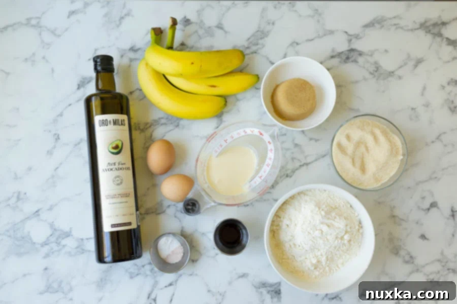 All ingredients for super moist banana bread including ripe bananas, oil, eggs, vanilla, salt, baking soda, buttermilk, brown sugar, cane sugar, and all-purpose flour