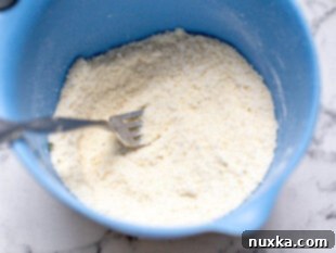 how to make an instant homemade alfredo sauce mix from garlic salt, onion powder, cornstarch, pepper, and parmesan cheese