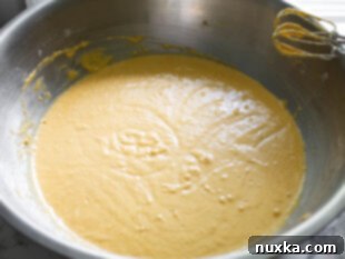 squash dinner rolls batter made with a hand mixer and pureed butternut squash