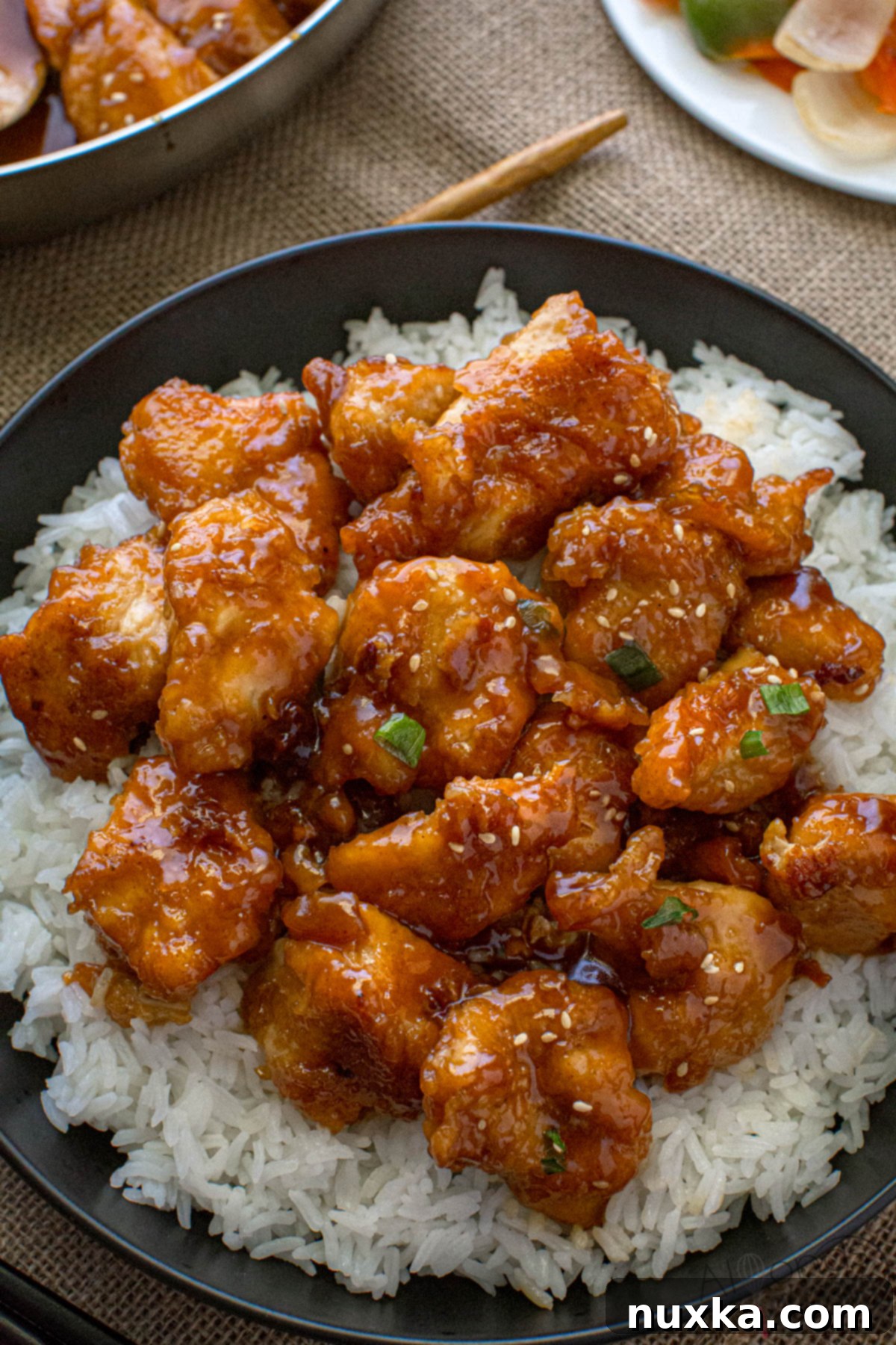 General Tso's Chicken recipe on a plate over white rice