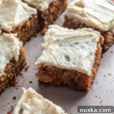 Moist Carrot Zucchini Cake 4 shredded carrot and zucchini cake made in a sheet pan