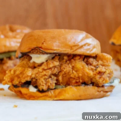 The Ultimate Homemade Popeyes Chicken Sandwich 2 How to Make a Popeyes chicken Sandwich recipe at home with a step-by-step tutorial, featuring golden crispy chicken.
