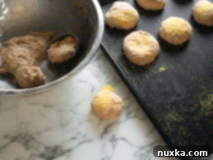 How to shape English muffins with whole wheat flour and dredge them in cornmeal.