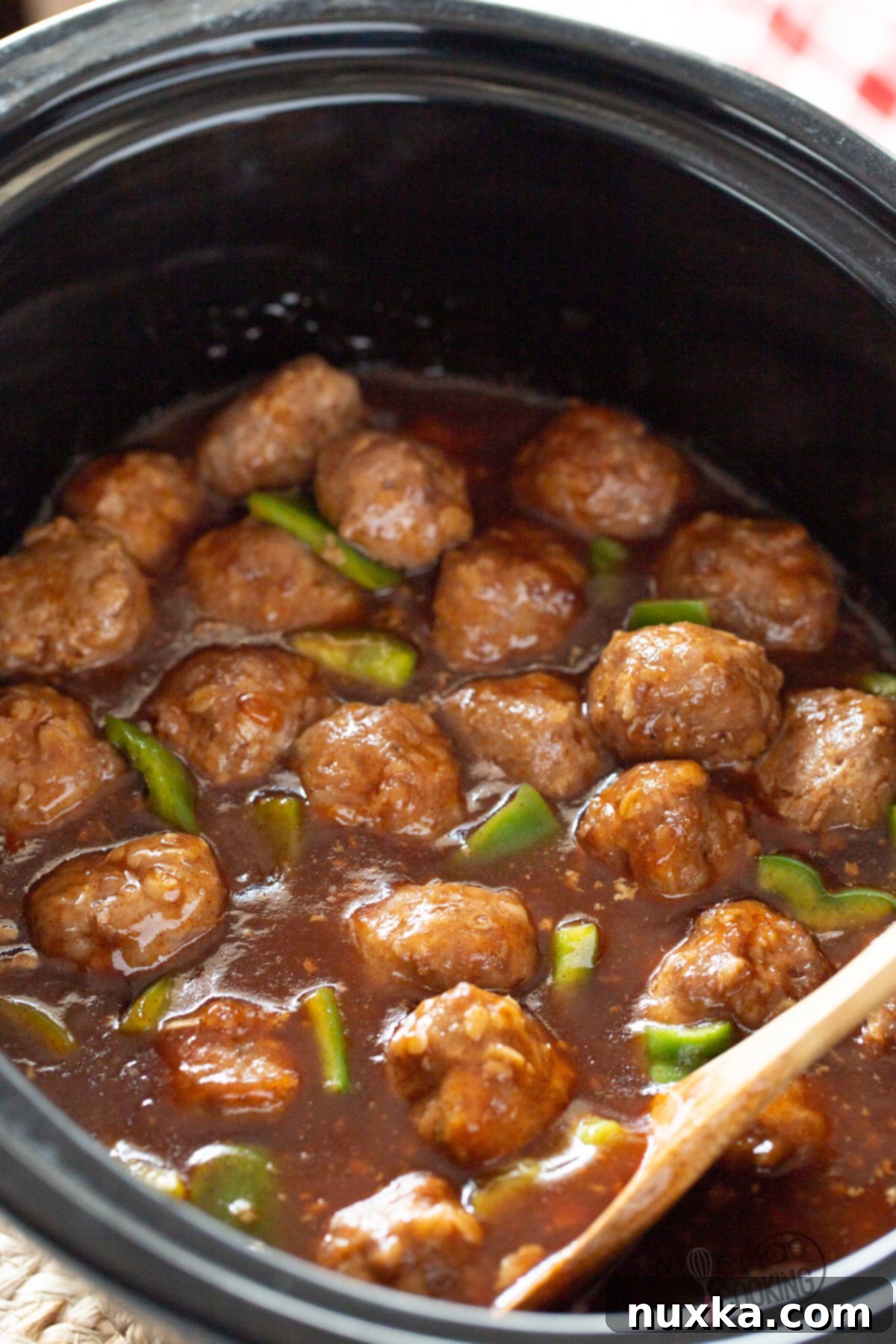Delicious Sweet and Sour Meatballs served in a bowl, ready to eat