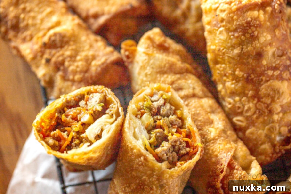 filling of a Chinese egg roll: cabbage, carrots, pork, soy sauce, sugar, white pepper - A close-up of the savory egg roll filling mixture.