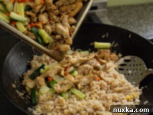 Finished Teriyaki Chicken Fried Rice mixed in the wok