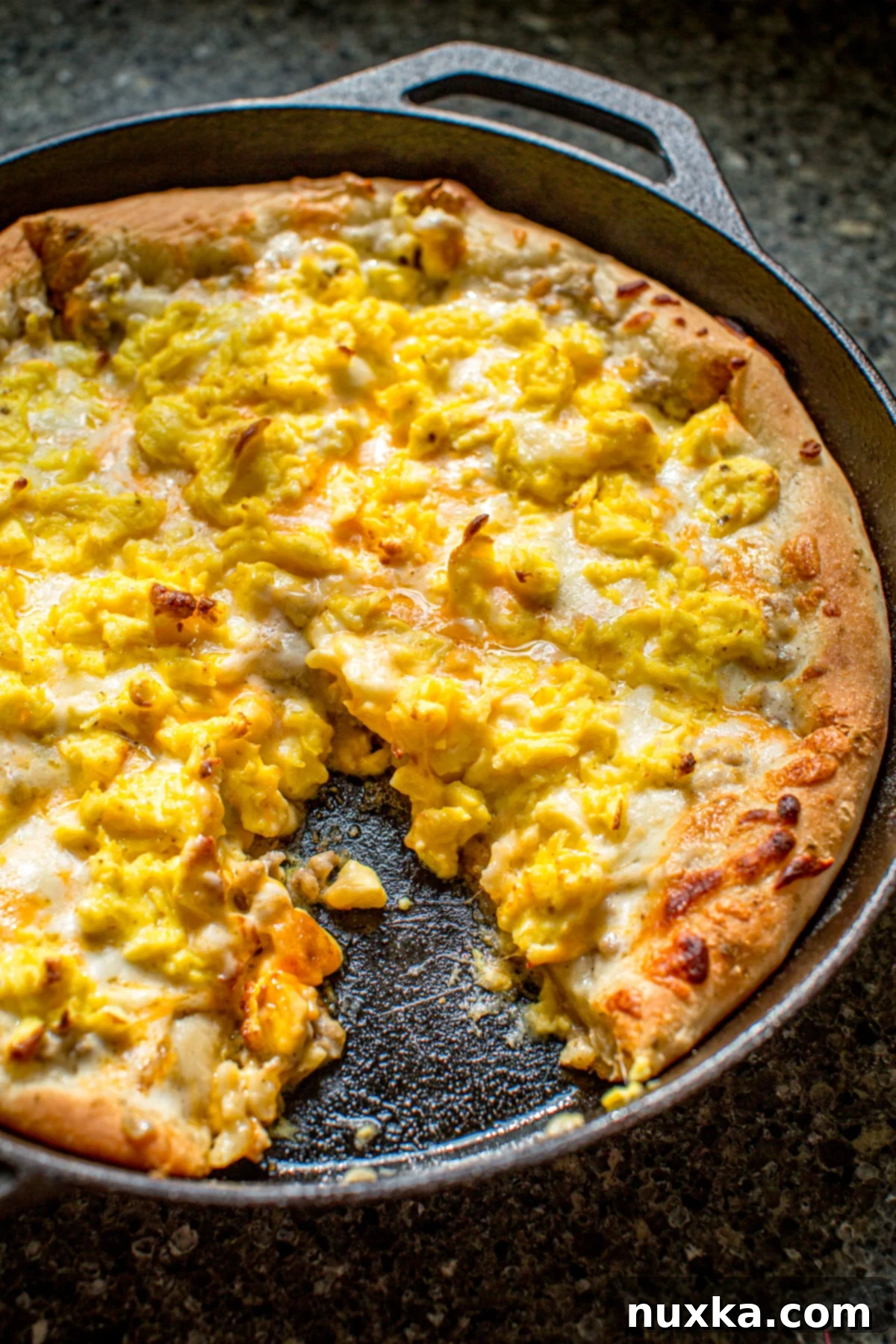 Breakfast pizza recipe with sausage gravy and a homemade pizza dough crust
