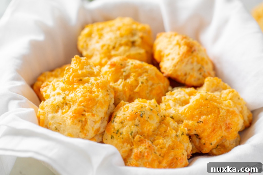 Red Lobster Cheddar Bay Biscuits Recipe, close up view on a baking sheet