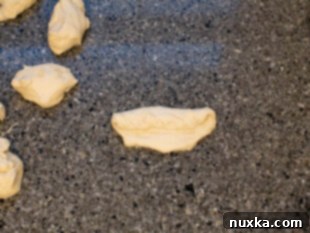 Portioned sourdough bagel dough ready for shaping