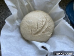 scoring whole wheat sourdough bread