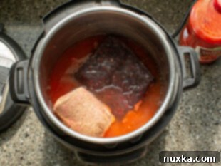 Layering ingredients in Instant Pot for chili