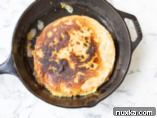 fried breakfast quesadilla in a skillet