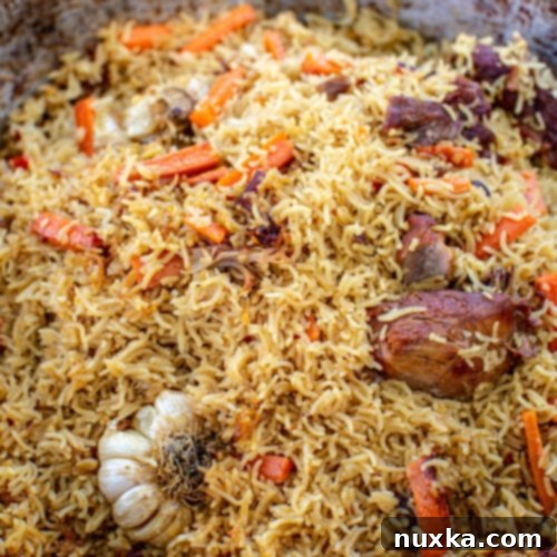 Crafting Perfect Uzbek Plov in Your Kazan 2 Authentic Uzbek Plov recipe in a Kazan with beef and garlic