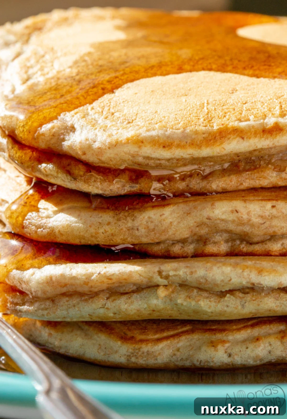 stack of healthy whole grain pancakes from freshly ground whole wheat flour