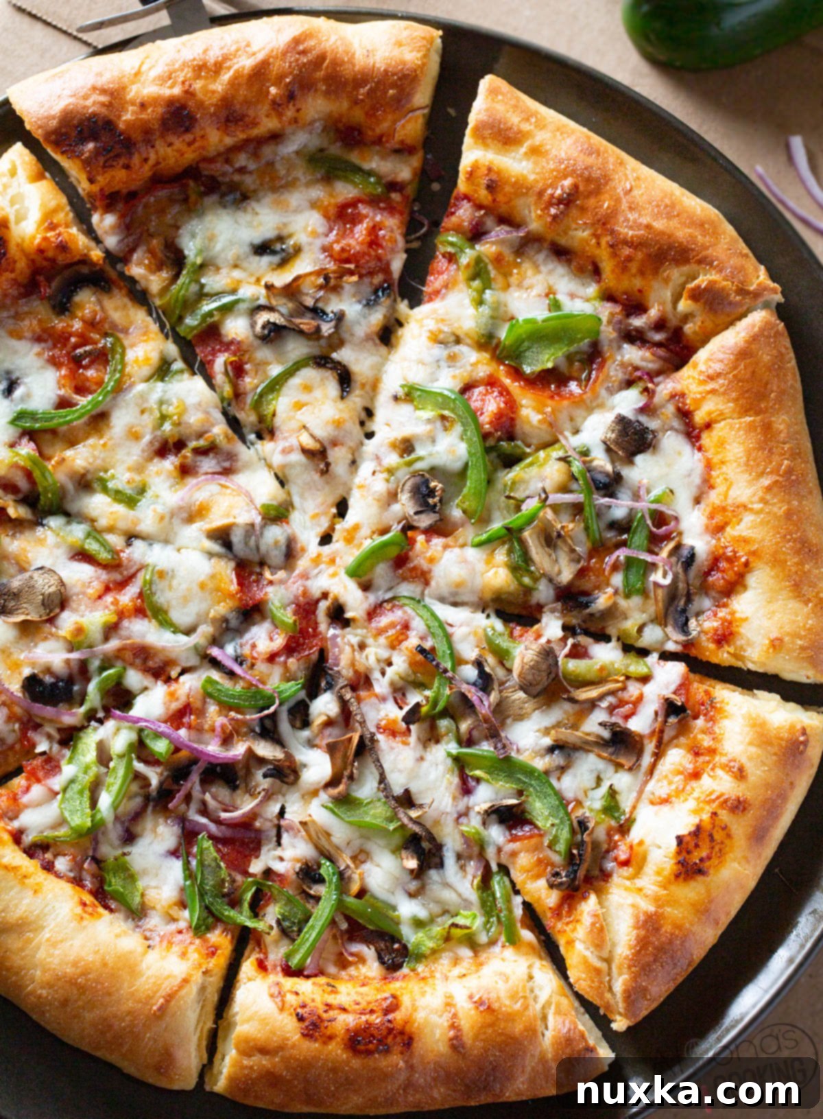 Delicious homemade Pizza Hut stuffed crust pizza with supreme toppings