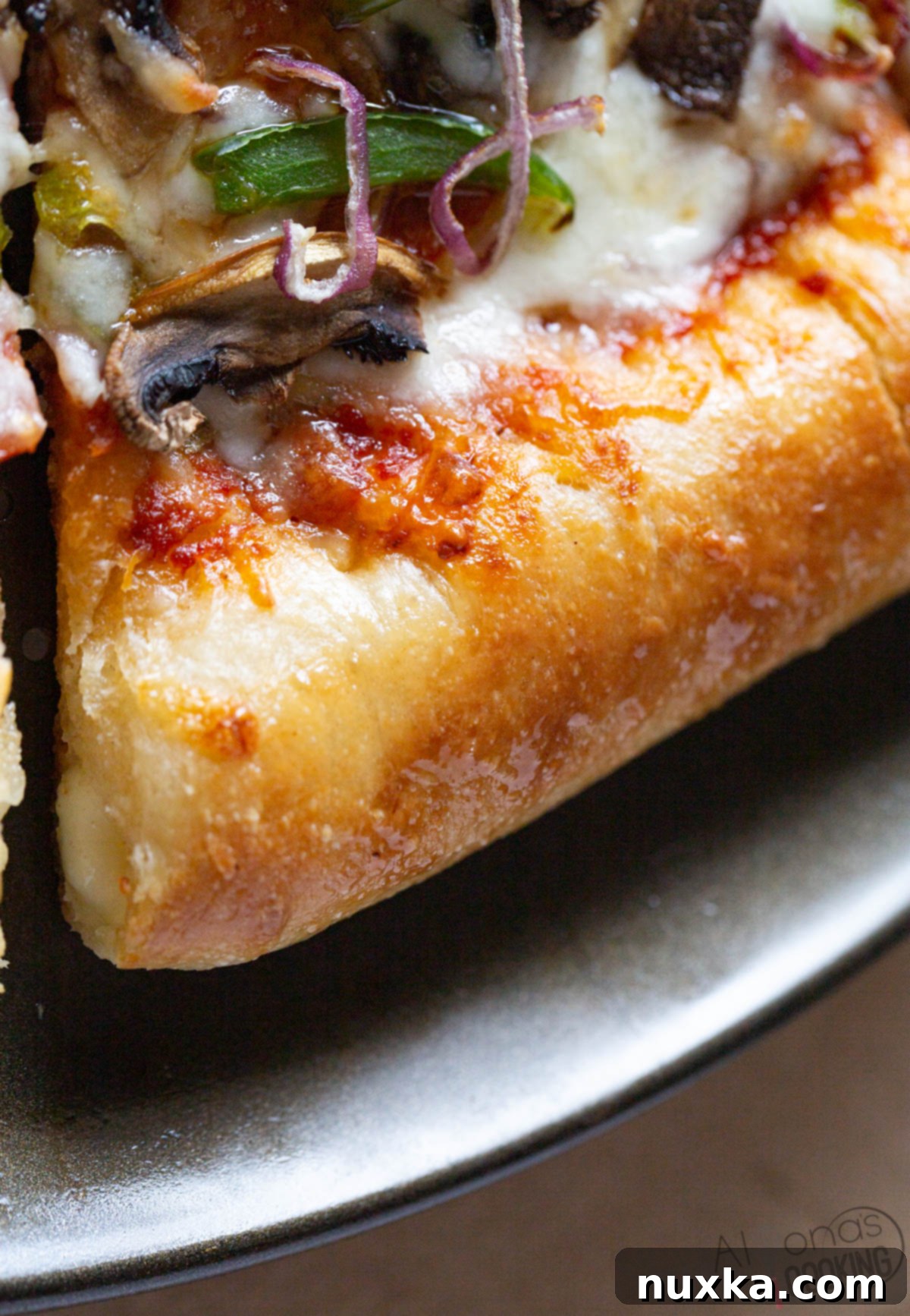 Golden-brown, cheesy stuffed crust pizza fresh from the oven