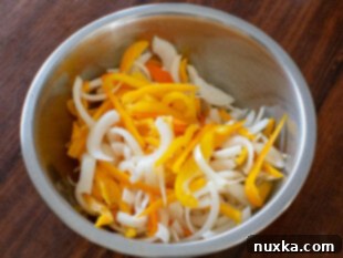 how to slice the bell peppers and onions for a chicken Philly Cheesesteak