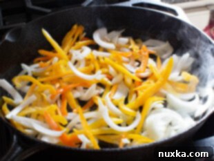 how to sauté peppers and onions in a skillet