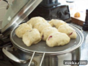 Step 4: Steam dumplings until fluffy and cooked through.