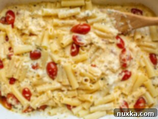 baked feta pasta mixed with cooked ziti pasta, cream, and parmesan cheese