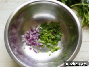 Finely dice red onion, jalapeno, and cilantro, then add to mashed avocados for guacamole.