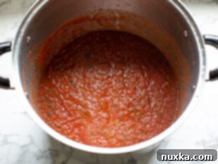 salsa simmering in a pot