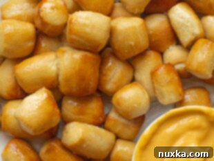 Final soft pretzel bites with a delicious cheddar cheese dip