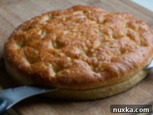 Assembling focaccia bread panini