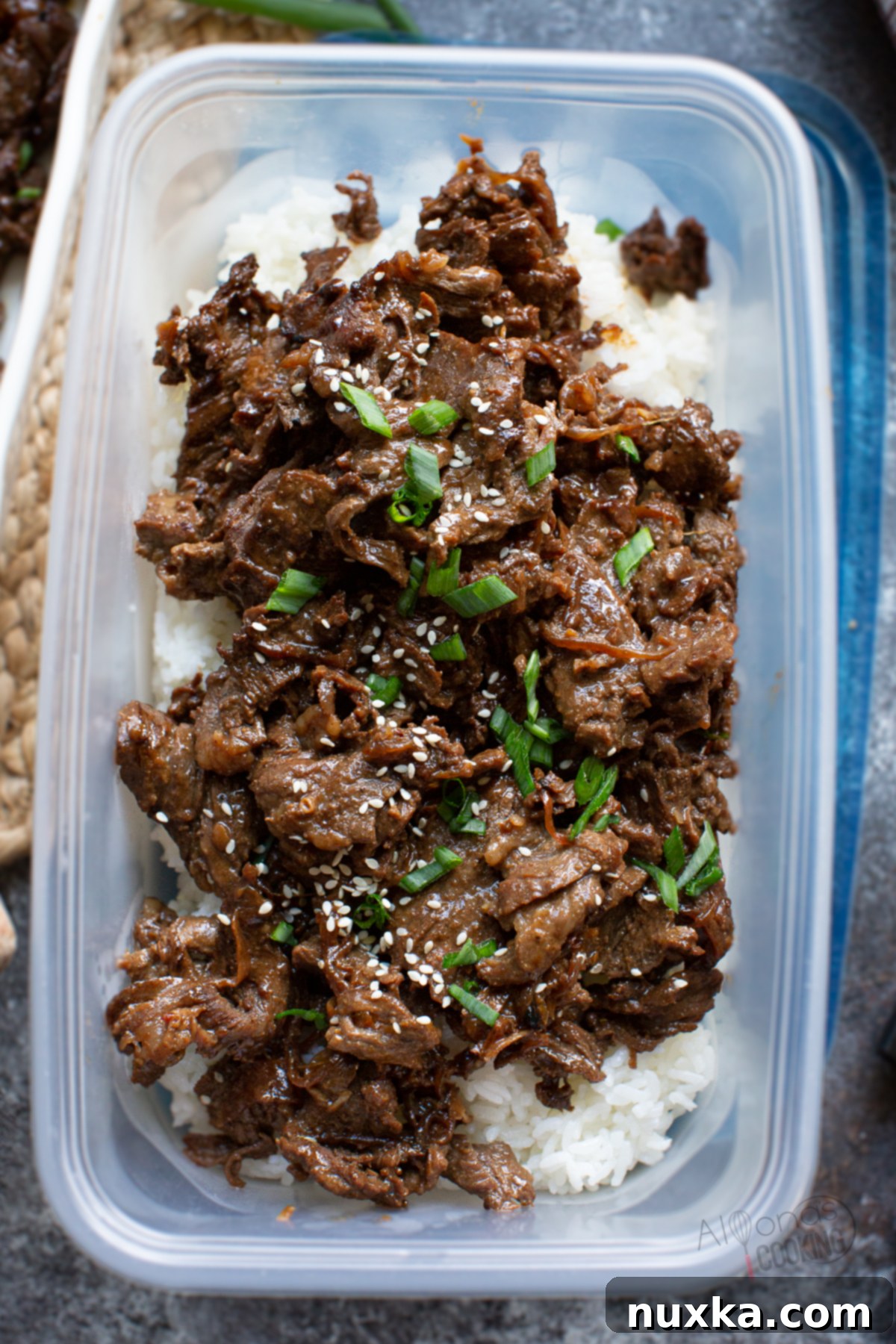 beef Bulgogi in a storage food container with rice and vegetables