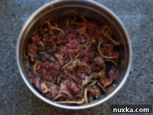 mixing bulgogi marinade ingredients with beef