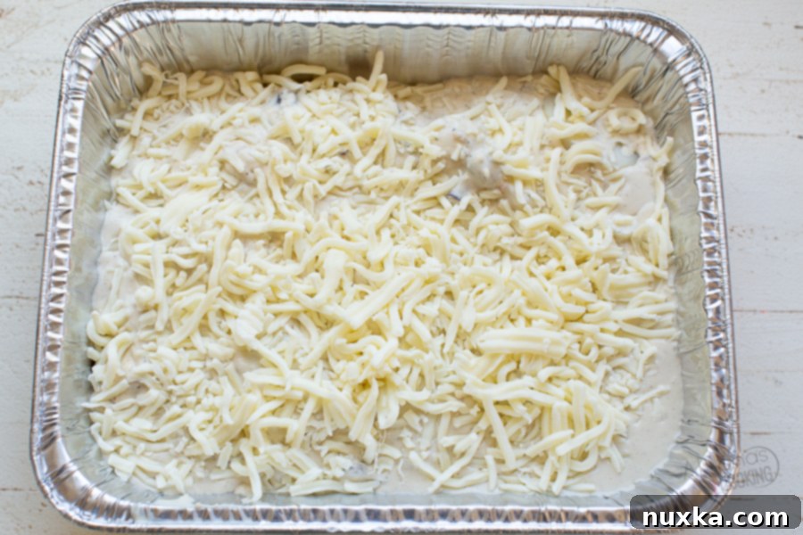 Assembling scalloped potatoes for freezing with aluminum foil