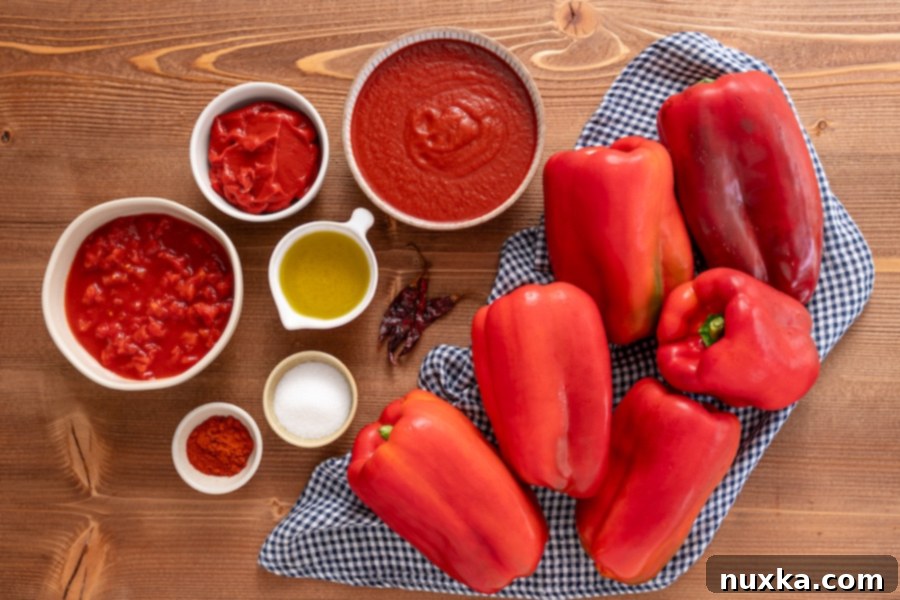 ingredients for Matbucha (tomatoes, red bell peppers, olive oil, salt, sugar, paprika, chili peppers).