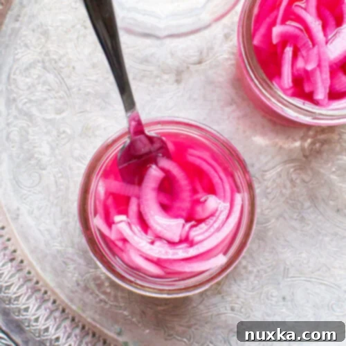 homemade pickled red onions in a jar