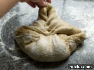 folding bread dough again
