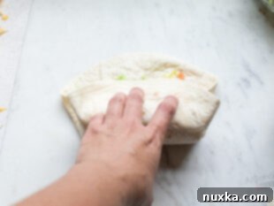 Rolling a Chipotle Ranch Grilled Chicken Burrito